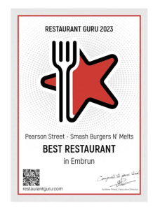 A mobile kitchen guru 2023 award certificate for "pearson street - smash burgers n' melts," featuring a red and white design with a fork and star logo.