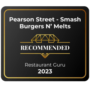 Black and gold plaque reading "pearson street - mobile kitchen, smash burgers n' melts, recommended restaurant guru 2023.